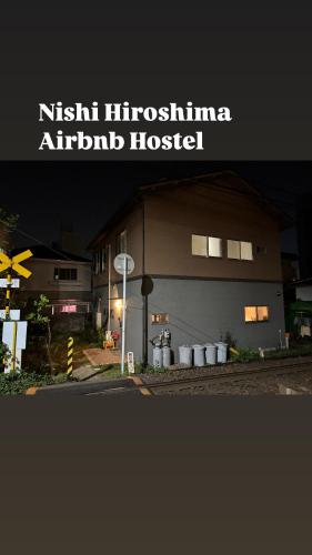 a picture of a building with a sign that saysitech houston airfield at Self check-in Hostel 5mins from JR Nishi Hiro station in Hiroshima