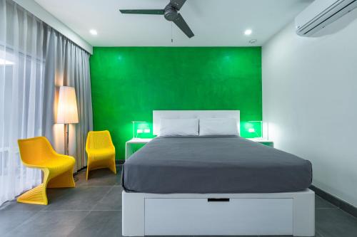Un ou plusieurs lits dans un hébergement de l'établissement WET hotel - Adults Only