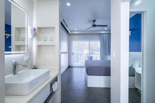 Salle de bains dans l'établissement WET hotel - Adults Only