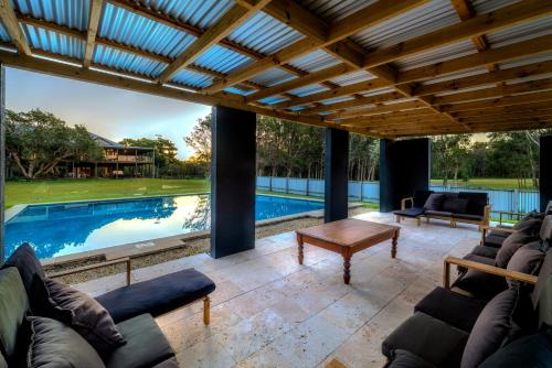 Πισίνα στο ή κοντά στο Tranquilo Beach House