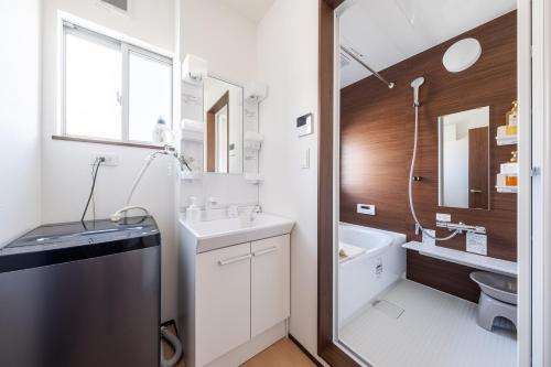 Koupelna v ubytování Private House Sora