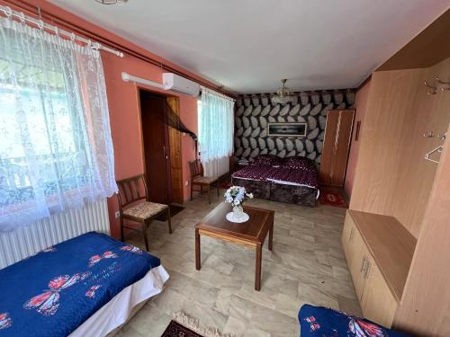 Postel nebo postele na pokoji v ubytování Nap körút Apartman