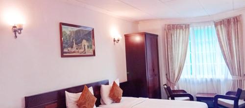 Katil atau katil-katil dalam bilik di The Rock Hotel