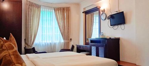 Televisyen dan/atau pusat hiburan di The Rock Hotel