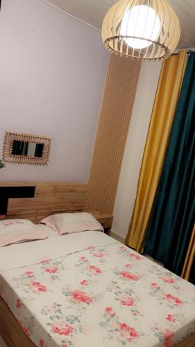 Una cama o camas en una habitación de L hortensia