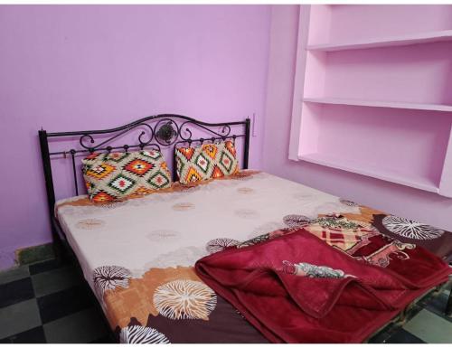 Postel nebo postele na pokoji v ubytování Hotel Kapil, Mount Abu