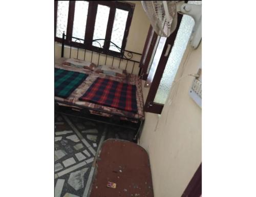 Postel nebo postele na pokoji v ubytování Hotel Kapil, Mount Abu