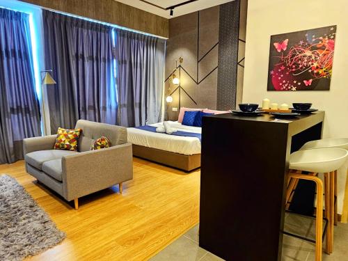 Гостиная зона в Leisure3 King Bed Imperium Residence Kuantan City View Studio