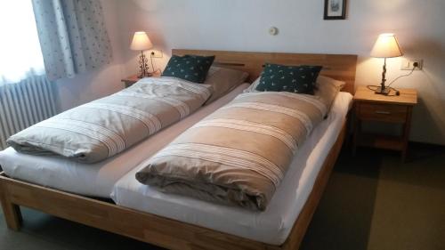 A bed or beds in a room at Ferienwohnung Kottulinsky