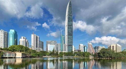 a view of a city skyline with a large skyscraper at shenzhen kaixin Hotel in Shenzhen