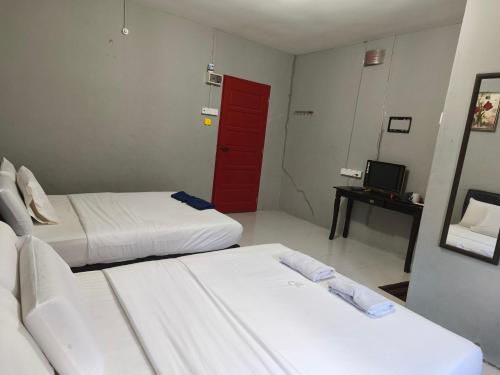 Кровать или кровати в номере Hotel O Selesa Inn