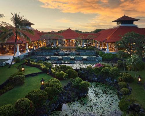 an aerial view of a resort with a garden at Grand Hyatt Bali in Nusa Dua