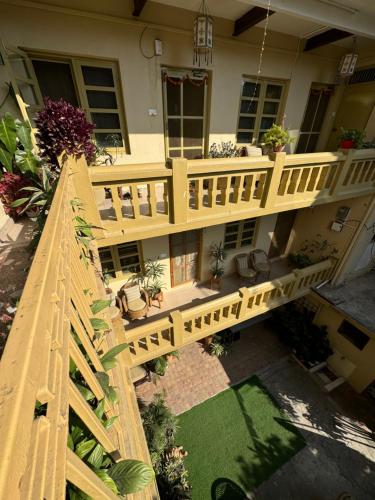 an aerial view of a house with a wooden deck at The Melo pomelo courtyard. ( Right in between Thamel and basantapur durbar square) in Kathmandu