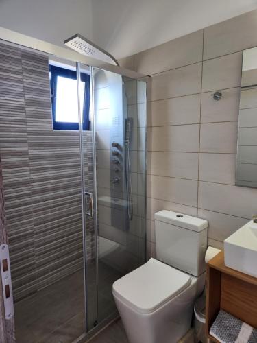 Ванная комната в Tarra Rooms and Apartments