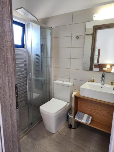 Ванная комната в Tarra Rooms and Apartments