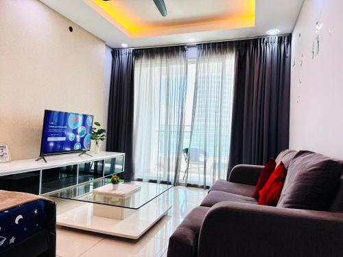 Hejmo Suitesにあるテレビまたはエンターテインメントセンター