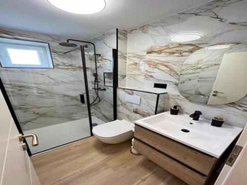 Ένα μπάνιο στο Apartments Kalinić