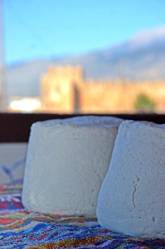two slices of white bread sitting on a table at Orthi Ammos in Frangokastello