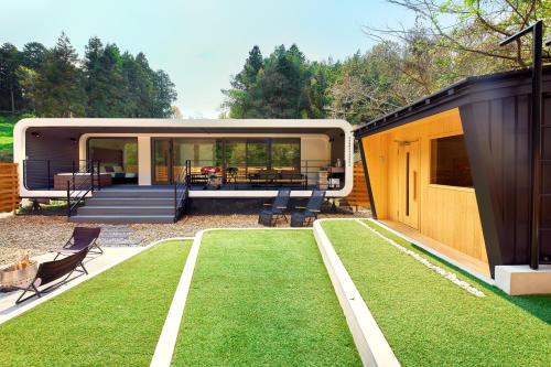 Κήπος έξω από το IZA Glamping 千早赤阪村