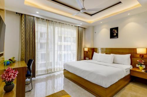 Postel nebo postele na pokoji v ubytování Far residency