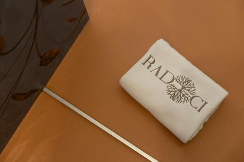 a white napkin with the word ko on it at Radici Tropea in Tropea
