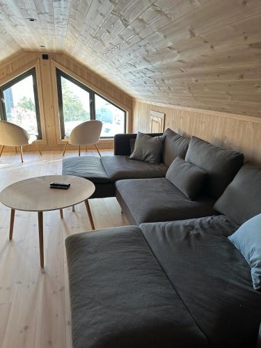 Χώρος καθιστικού στο Modern cabin with sea view at the Norwegian costline
