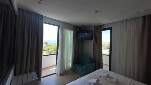 Ένα ή περισσότερα κρεβάτια σε δωμάτιο στο Hotel Boutique Onix