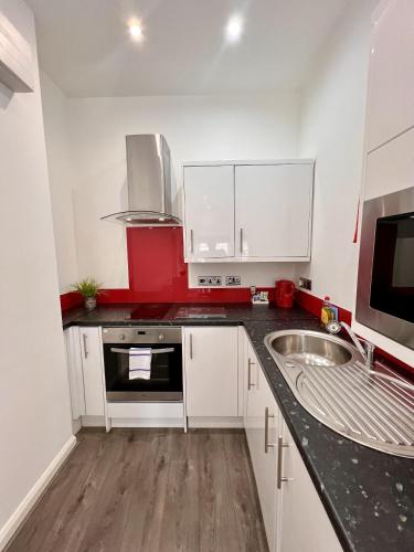 Kuchyň nebo kuchyňský kout v ubytování Fox House Studios, Aparthotel