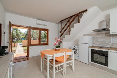Kuchyň nebo kuchyňský kout v ubytování Residence Li Menduli