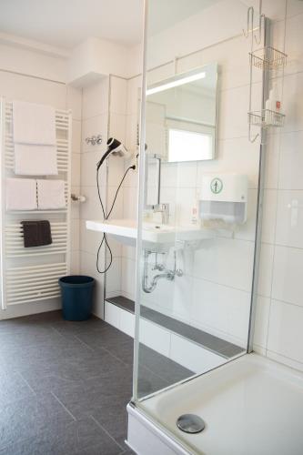 Salle de bains dans l'établissement Hotel Martinihof