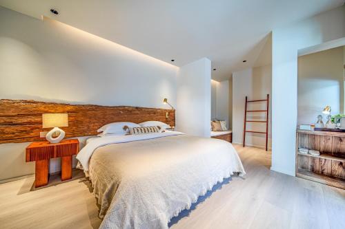 Katil atau katil-katil dalam bilik di Sun Nest Yoga Designer Meisu Lijiang Shuhe Ancient Town Branch
