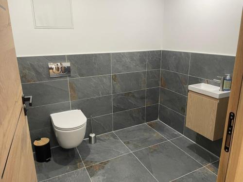 Un baño de Gîte L'Après-Ski, Spa, Spacieux