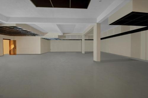 an empty room with white walls and white ceilings at Collection O Aloft in Jaipur