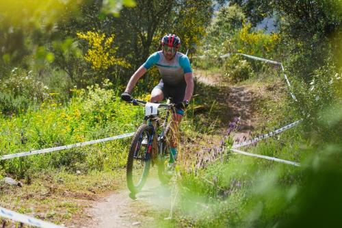 a man riding a bike on a dirt road at T2 Ansião in Ancião