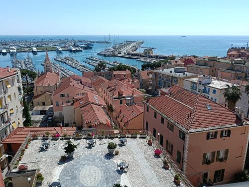 an aerial view of a city with a harbor at Hotel Robinia in Imperia