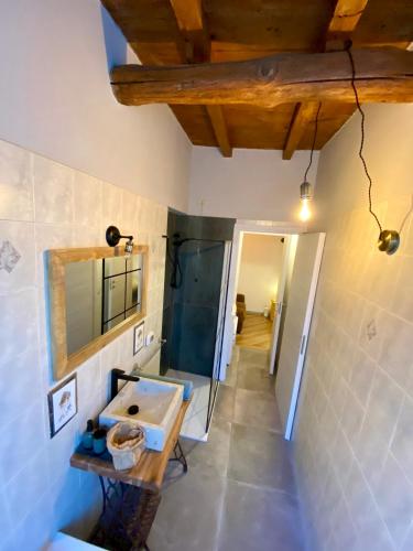 Ванная комната в Ruti's House - Monolocale con travi a vista vicino Malpensa e Milano Rho Fiera