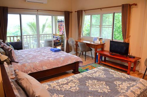 เตียงในห้องที่ Pua Tranquil Vista Homestay