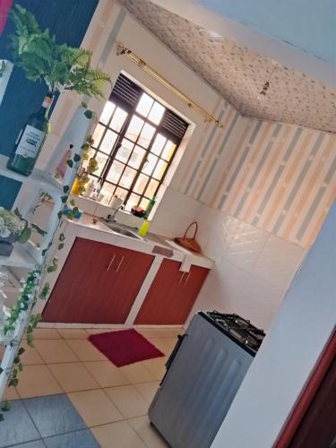 Kuchyň nebo kuchyňský kout v ubytování Lovely one bedroom airbb in THIKA with WiFi ,ample parking-next to the road