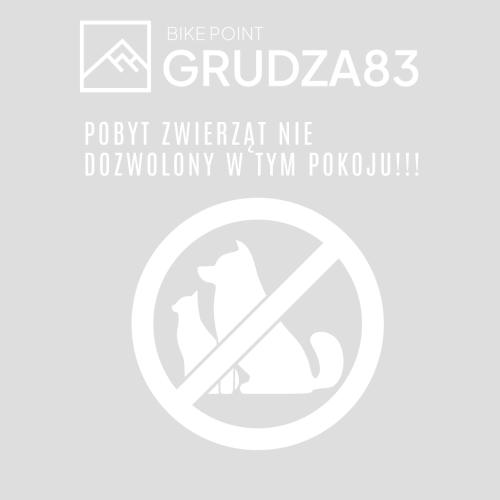 a sign with a no smoking sign on a white background at Grudza83 Bikepoint in Mirsk