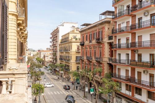 a street in the city with buildings at A Casa di Amici in Palermo