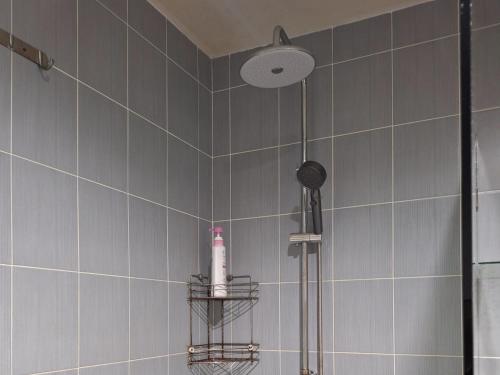a bathroom with a shower with a shower head at Neo2 condo 703 in Jomtien Beach