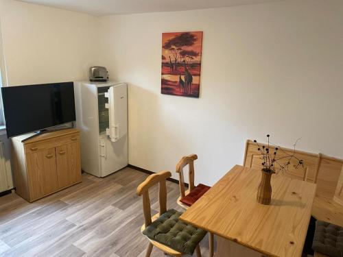 Μια τηλεόραση ή/και κέντρο ψυχαγωγίας στο Obermain Apartment