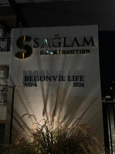 a sign that says sakalam antiquation on a building at Begonvil Life in Gazipasa