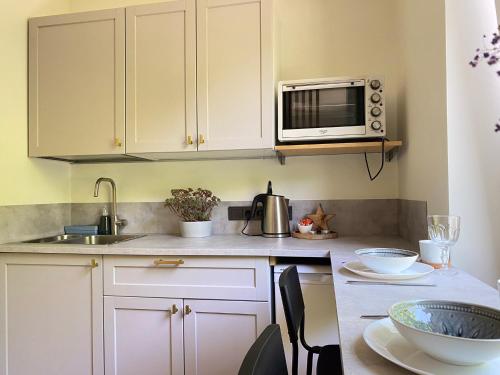 Kép Cozy and bright Šaulių studio in Klaipeda szállásáról Klaipėdában a galériában