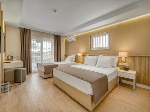 Postel nebo postele na pokoji v ubytování Park Hotel