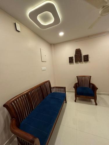 Χώρος καθιστικού στο Srirangam Service Apartment
