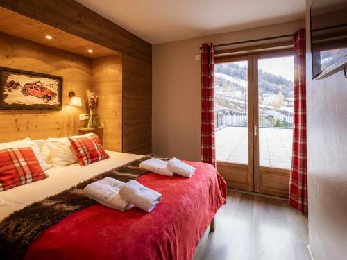Ένα ή περισσότερα κρεβάτια σε δωμάτιο στο Appartement 4 pièces 8 pers, Sud, près du téléphérique, avec terrasse et équipements modernes - FR-1-263-217