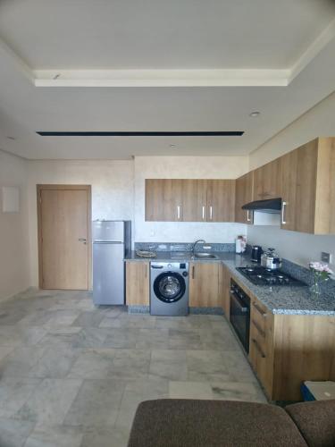 Una cocina o cocineta en Studio Zen vue sur mer