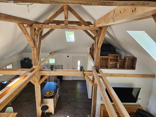 a loft conversion of a house with wooden beams at Cottage am Michelsberg in Bad Münstereifel