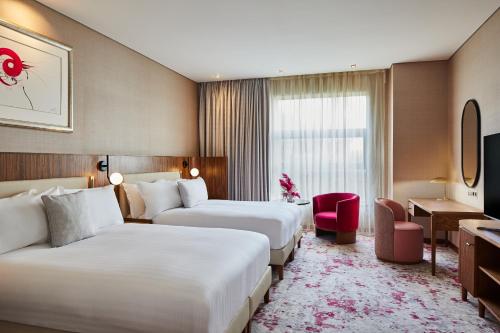 TV a/nebo společenská místnost v ubytování The g Hotel & Spa